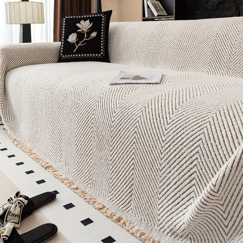 CozyGuard - Protective Herringbone Sofa Cover with Fringe Detail