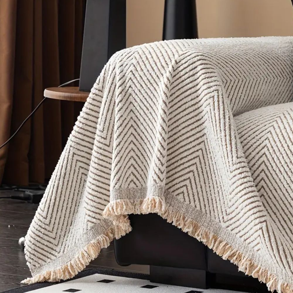 CozyGuard - Protective Herringbone Sofa Cover with Fringe Detail