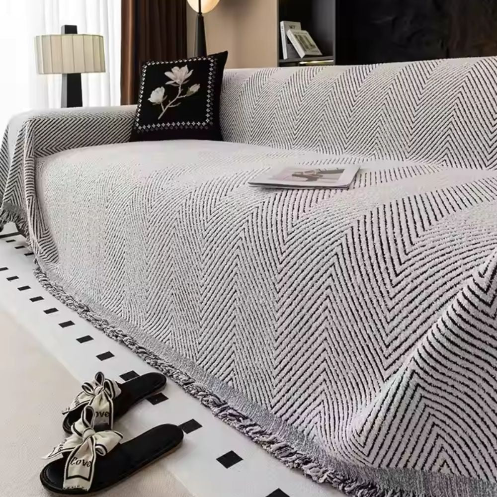 CozyGuard - Protective Herringbone Sofa Cover with Fringe Detail